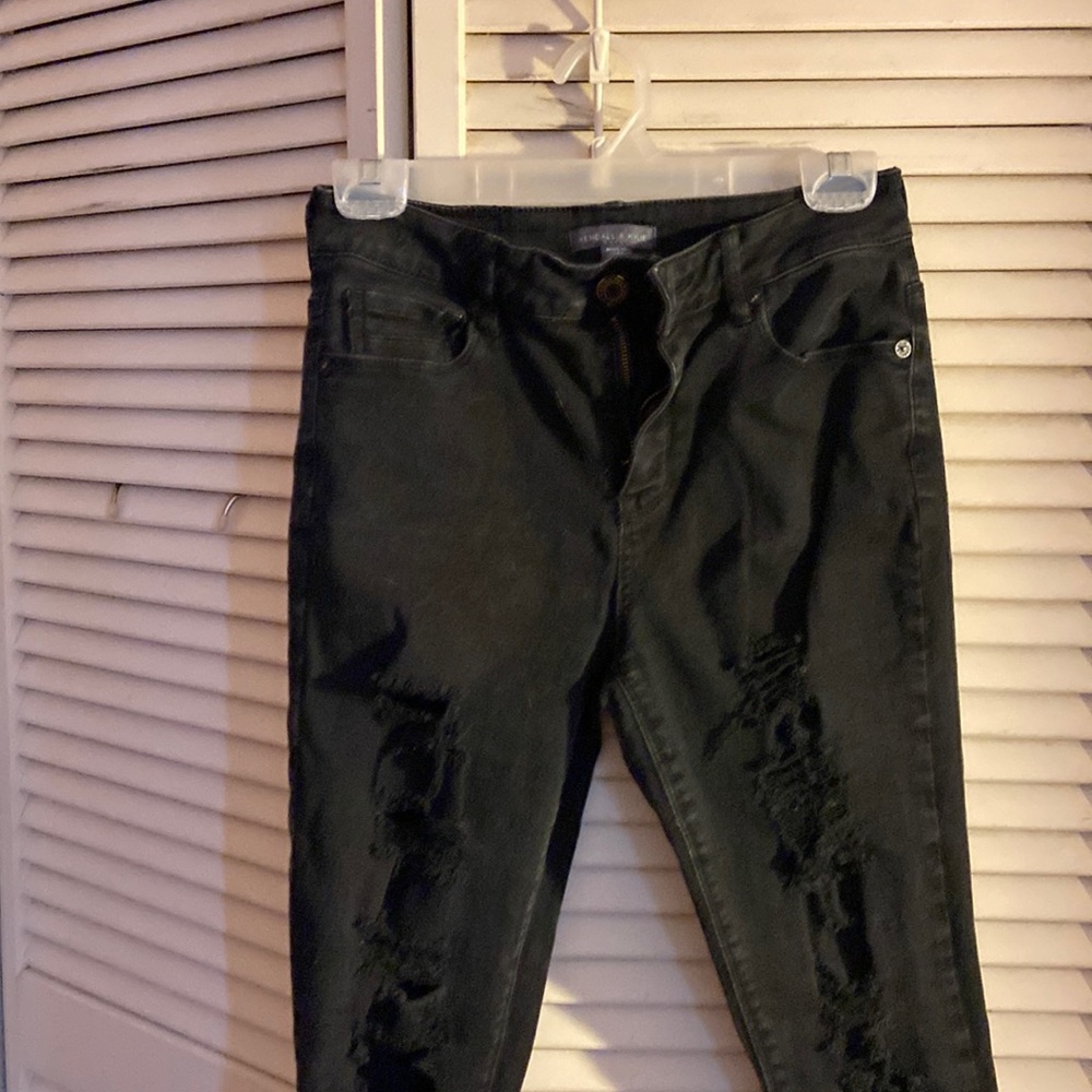 Black jeans ripped in front only great shape